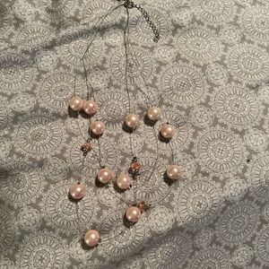 Multi level pearl necklace